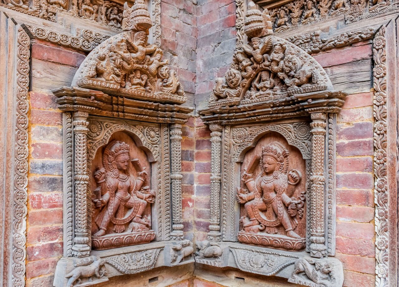 Geschnitzte Statuen an der Hofmauer von Mul Chowk, Hanuman Dhoka Kathmandu